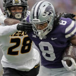 Kansas State wide receiver Phillip Brooks (8) is tackled by Missouri defensive back Joseph Charleston (28) during the first half of an NCAA college football game Saturday, Sept. 10, 2022, in Manhattan, Kan. (AP Photo/Charlie Riedel)