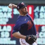 
              Minnesota Twins pitcher Caleb Thielbar throws in relief against the Cleveland Guardians in the fifth inning of a baseball game, Sunday, Sept 11, 2022, in Minneapolis. (AP Photo/Jim Mone)
            