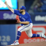 Toronto Blue Jays starting pitcher Alek Manoah throws against the Tampa Bay Rays during the first inning of the second baseball game of a doubleheader Tuesday, Sept. 13, 2022, in Toronto. (Frank Gunn/The Canadian Press via AP)