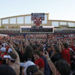 
              Texas Tech fans celebrate on the field after an NCAA college football game against Texas, Saturday, Sept. 24, 2022, in Lubbock, Texas. (AP Photo/Brad Tollefson)
            