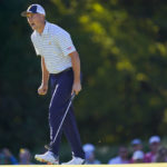 
              Jordan Spieth reacts aftering winning the hole during their fourball match at the Presidents Cup golf tournament at the Quail Hollow Club, Friday, Sept. 23, 2022, in Charlotte, N.C. (AP Photo/Julio Cortez)
            