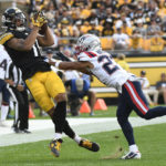 
              Pittsburgh Steelers wide receiver Chase Claypool (11) hauls in a pass from quarterback Mitch Trubisky with New England Patriots cornerback Myles Bryant (27) defending during the first half of an NFL football game in Pittsburgh, Sunday, Sept. 18, 2022. (AP Photo/Don Wright)
            