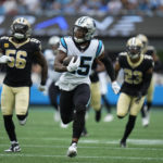 
              Carolina Panthers wide receiver Laviska Shenault Jr. (15) runs the ball down the field for 67 yards during the second half of an NFL football game against the New Orleans Saints, Sunday, Sept. 25, 2022, in Charlotte, N.C. (AP Photo/Rusty Jones)
            