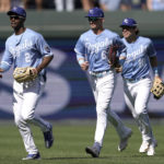 
              Kansas City Royals' Michael A. Taylor (2), Drew Waters (6) and Nate Eaton (18) celebrate after their baseball game against the Detroit Tigers Sunday, Sept. 11, 2022, in Kansas City, Mo. The Royals won 4-0. (AP Photo/Charlie Riedel)
            
