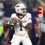 
              Arkansas quarterback KJ Jefferson (1) looks for an open receiver during the first half of the team's NCAA college football game against Texas A&M on Saturday, Sept. 24, 2022, in Arlington, Texas. (AP Photo/Brandon Wade)
            