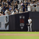 New York Yankees left fielder Aaron Hicks reacts after missing a catch on a RBI double hit by Tampa Bay Rays' Wander Franco during the fourth inning of a baseball game Friday, Sept. 9, 2022, in New York. (AP Photo/Adam Hunger)