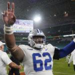 Middle Tennessee offensive lineman Jordan Palmer (62) celebrates after Middle Tennessee beat Miami 45-31 in an NCAA college football game, Saturday, Sept. 24, 2022, in Miami Gardens, Fla. (AP Photo/Wilfredo Lee)