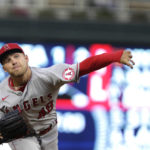 
              Los Angeles Angels starting pitcher Reid Detmers throws to a Minnesota Twins during the second inning of a baseball game Saturday, Sept. 24, 2022, in Minneapolis. (AP Photo/Andy Clayton-King)
            