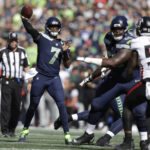 
              Seattle Seahawks quarterback Geno Smith throws a pass during the first half of an NFL football game against the Atlanta Falcons Sunday, Sept. 25, 2022, in Seattle. (AP Photo/John Froschauer)
            