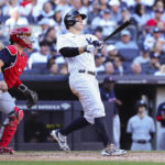 New York Yankees' Anthony Rizzo and Boston Red Sox catcher Reese McGuire watch Rizzo's home run during the seventh inning of a baseball game Saturday, Sept. 24, 2022, in New York. (AP Photo/Jessie Alcheh)