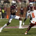 
              Mississippi State wide receiver Caleb Ducking (4) is pursued by Bowling Green safety Trent Simms (8) after catching a pass for a first down during the first half of an NCAA college football game in Starkville, Miss., Saturday, Sept. 24, 2022. (AP Photo/Rogelio V. Solis)
            