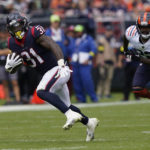 
              Houston Texans running back Dameon Pierce (31) runs for a gain against the Chicago Bears during the first half of an NFL football game Sunday, Sept. 25, 2022, in Chicago. (AP Photo/Charles Rex Arbogast)
            