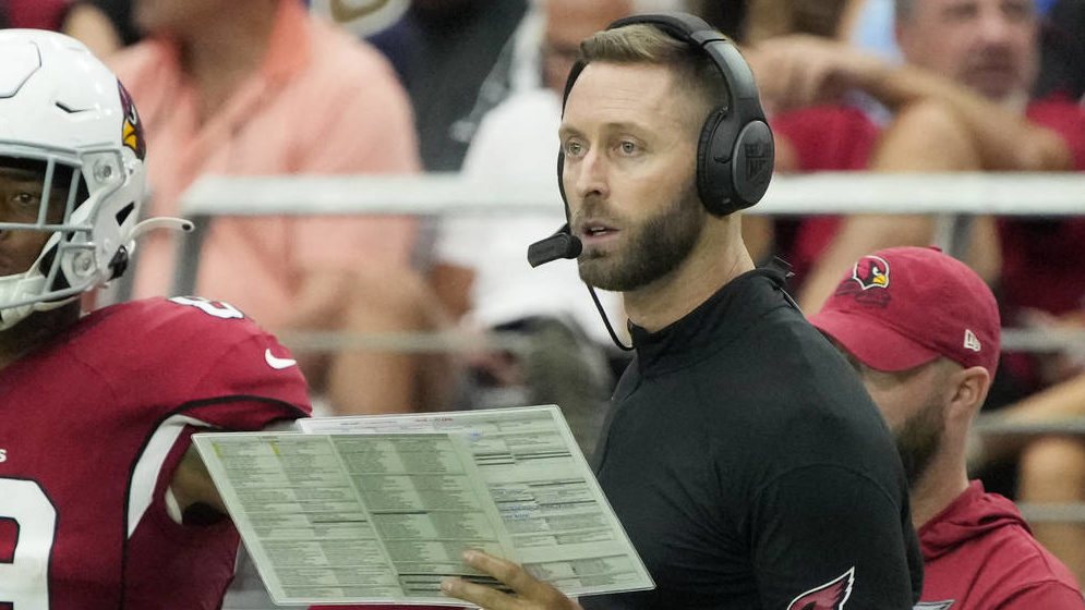 Arizona Cardinals head coach Kliff Kingsbury watches during the first half of an NFL football game ...