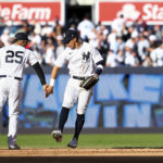 
              New York Yankees left fielder Oswaldo Cabrera, right, celebrates with second baseman Gleyber Torres (25) after defeating the Boston Red Sox in a baseball game Saturday, Sept. 24, 2022, in New York. (AP Photo/Jessie Alcheh)
            