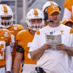 
              Tennessee head coach Josh Heupel watches his team during the first half of an NCAA college football game against Florida, Saturday, Sept. 24, 2022, in Knoxville, Tenn. (AP Photo/Wade Payne)
            