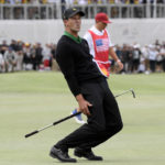 
              FILE - International team player Adam Scott of Australia grimaces after missing a putt on the 16th green in his singles match during the Presidents Cup golf tournament at Royal Melbourne Golf Club in Melbourne, Sunday, Dec. 15, 2019. The last Presidents Cup was so close the International team walked away with renewed hope that it had enough game and enough fight to conquer the mighty Americans. (AP Photo/Andy Brownbill, File)
            