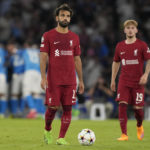 
              Liverpool's Mohamed Salah, centre, reacts after his team misses fourth goal during the group A Champions League soccer match between Napoli and Liverpool at the Diego Armando Maradona stadium in Naples, Italy, Wednesday, Sept. 7, 2022. (AP Photo/Andrew Medichini)
            