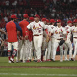 
              St. Louis Cardinals celebrate their team's 8-4 victory in a baseball game against the Chicago Cubs on Saturday, Sept. 3, 2022, in St. Louis. (AP Photo/Joe Puetz)
            