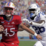 
              Kansas tight end Trevor Kardell (45) is chased by Duke defensive back Joshua Pickett (26) as he runs for a touchdown during the first half of an NCAA college football game Saturday, Sept. 24, 2022, in Lawrence, Kan. (AP Photo/Charlie Riedel)
            