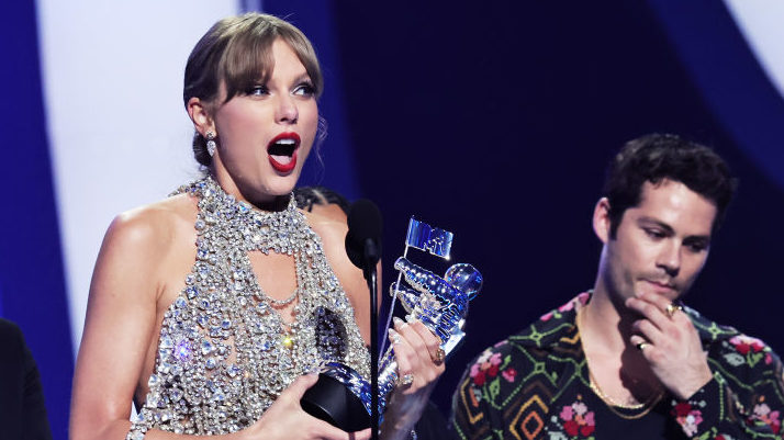Taylor Swift accepts an award onstage at the 2022 MTV VMAs at Prudential Center on August 28, 2022 ...