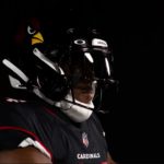 Arizona Cardinals safety Jalen Thompson models the team's alternate black uniforms with the new black alternative helmet. (Arizona Cardinals Photo)