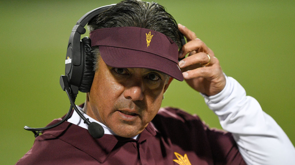Interim head coach Shaun Aguano of the Arizona State Sun Devils looks on from the sideline in the f...