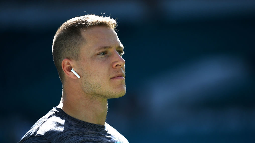 Christian McCaffrey #22 of the Carolina Panthers looks on during pregame warm-ups before the game a...