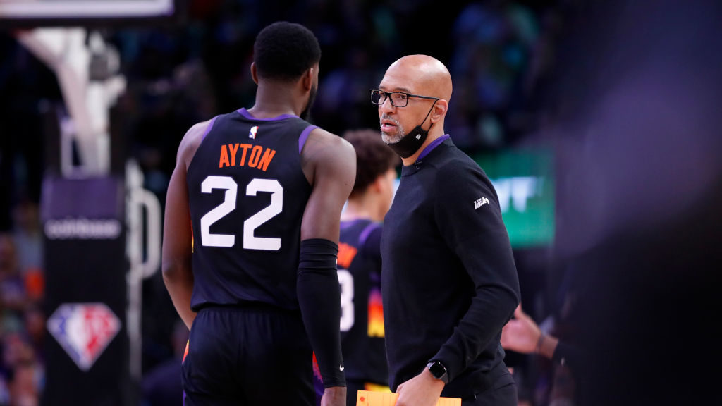 Head coach Monty Williams and Deandre Ayton #22 of the Phoenix Suns during the first half against t...