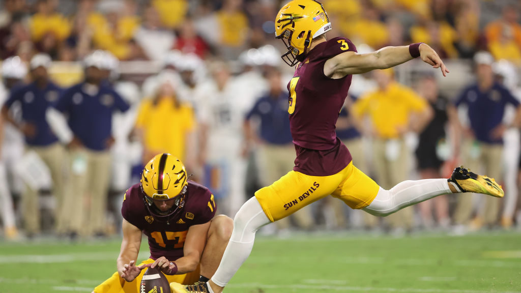 Place kicker Carter Brown #3 of the Arizona State Sun Devils kicks a field goal against the Norther...