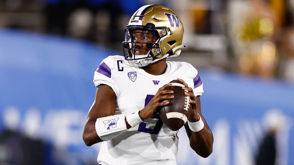 Michael Penix Jr. #9 of the Washington Huskies throws against the UCLA Bruins in the first quarter ...