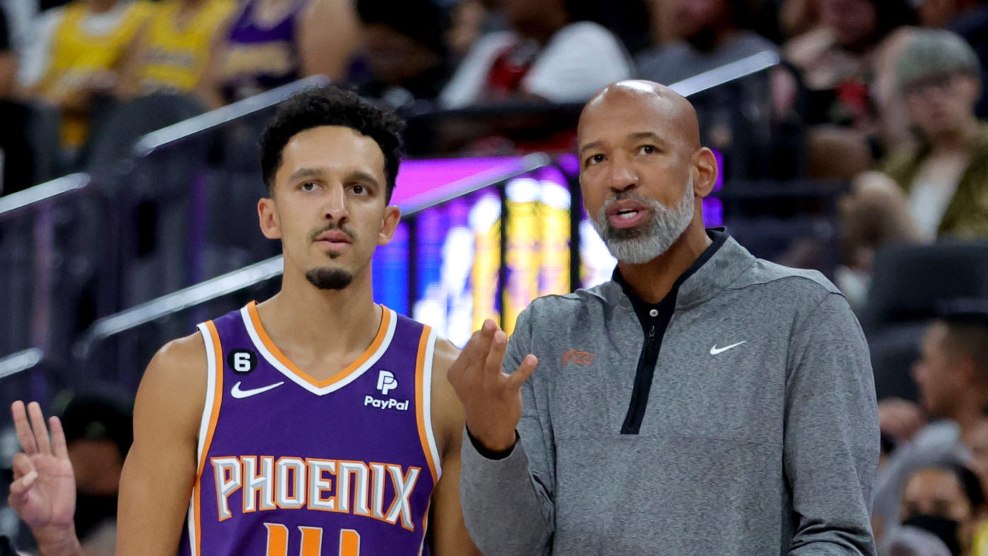 Landry Shamet #14 and head coach Monty Williams of the Phoenix Suns talk in the second quarter of t...