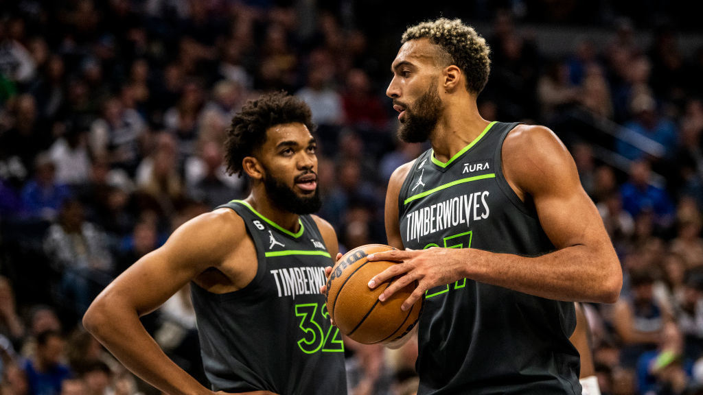 Rudy Gobert #27 of the Minnesota Timberwolves and Karl-Anthony Towns #32 react after a play in the ...