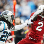
              Arizona Cardinals wide receiver Marquise Brown catches a pass ahead of Carolina Carolina Panthers cornerback Keith Taylor Jr. during the first half of an NFL football game on Sunday, Oct. 2, 2022, in Charlotte, N.C. (AP Photo/Rusty Jones)
            
