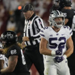 Kansas State linebacker Nick Allen (52) reacts after tripping Iowa State quarterback Hunter Dekkers (not shown) during the first half of an NCAA college football game, Saturday, Oct. 8, 2022, in Ames, Iowa. (Matthew Putney)