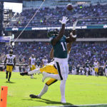 
              Philadelphia Eagles wide receiver A.J. Brown (11) catches a touchdown pass against Pittsburgh Steelers cornerback Ahkello Witherspoon (25) during the first half of an NFL football game between the Pittsburgh Steelers and Philadelphia Eagles, Sunday, Oct. 30, 2022, in Philadelphia. (AP Photo/Derik Hamilton)
            