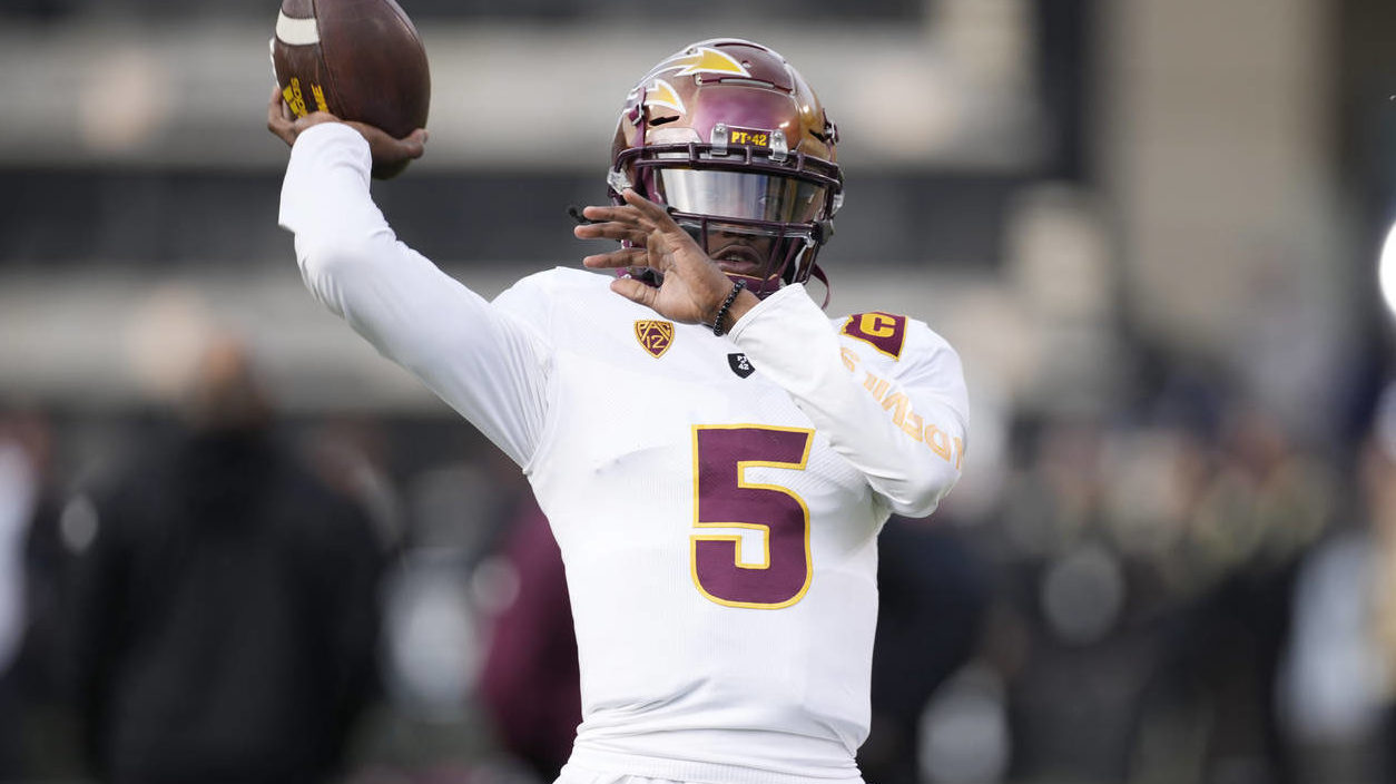 Arizona State quarterback Emory Jones warms up before an NCAA college football game against Colorad...