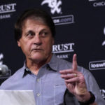 
              Chicago White Sox manager Tony La Russa reads from a statement announcing his retirement from the team due to medical reason before a baseball game between the White Sox and the Minnesota Twins, Monday, Oct. 3, 2022, in Chicago. (AP Photo/Charles Rex Arbogast)
            