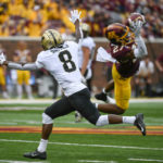 
              Minnesota defensive back Tyler Nubin, right, intercepts a pass intended for Purdue wide receiver TJ Sheffield (8) during the first half an NCAA college football game on Saturday, Oct. 1, 2022, in Minneapolis. (AP Photo/Craig Lassig)
            
