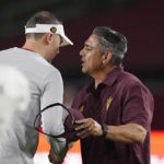 Southern California head coach Lincoln Riley, left, and Arizona State head coach Shaun Aguano shake hands after an NCAA college football game Saturday, Oct. 1, 2022, in Los Angeles. USC won 42-25. (AP Photo/Mark J. Terrill)