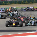 
              Red Bull driver Max Verstappen, front, of the Netherlands, leads Mercedes driver Lewis Hamilton, right, of Britain, and the rest of the field during the Formula One U.S. Grand Prix auto race at Circuit of the Americas, Sunday, Oct. 23, 2022, in Austin, Texas. (AP Photo/Charlie Neibergall)
            