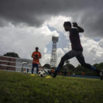 
              Youths train at the Pedro Marrero stadium in Havana, Cuba, Wednesday, Sept. 14, 2022. Soccer coaches across Cuba are training dozens of players as part of a new program to elevate the sport's profile and status in a country that last qualified for the FIFA World Cup in 1938. (AP Photo/Ramon Espinosa)
            