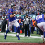 
              New York Giants quarterback Daniel Jones (8) crosses the goal line for a touchdown against the Chicago Bears during the second quarter of an NFL football game, Sunday, Oct. 2, 2022, in East Rutherford, N.J. (AP Photo/Seth Wenig)
            