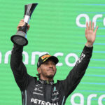 
              Mercedes driver Lewis Hamilton, of Britain, raises his trophy after finishing second in the Formula One U.S. Grand Prix auto race at Circuit of the Americas, Sunday, Oct. 23, 2022, in Austin, Texas. (AP Photo/Charlie Neibergall)
            