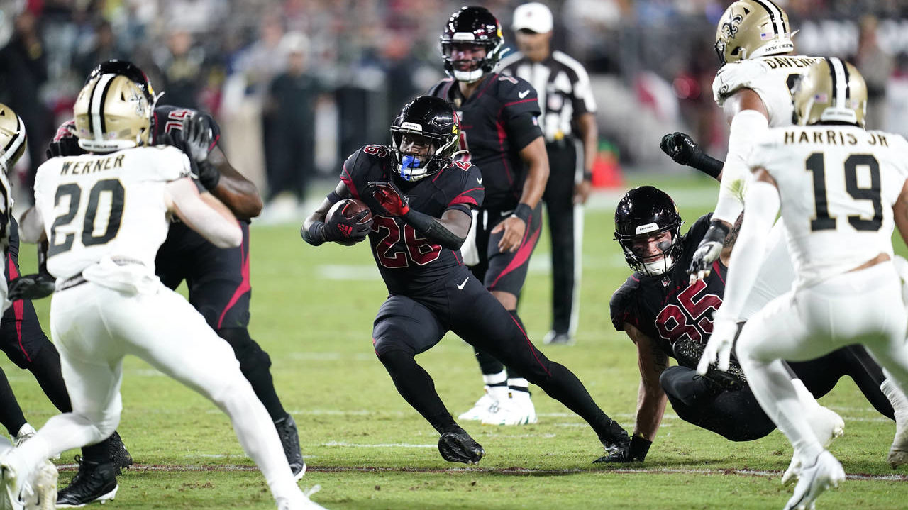Arizona Cardinals running back Eno Benjamin (26) carries for a first down during the first half of ...