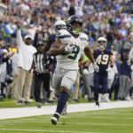 
              Seattle Seahawks running back Kenneth Walker III (9) runs to the end zone for a touchdown during the second half of an NFL football game against the Los Angeles Chargers Sunday, Oct. 23, 2022, in Inglewood, Calif. (AP Photo/Mark J. Terrill)
            
