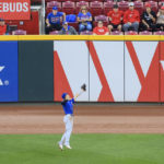 Chicago Cubs' Seiya Suzuki leaps to make a catch for an out on a ball hit by Cincinnati Reds' Michael Siani during the third inning of a baseball game in Cincinnati, Friday, Wednesday, Oct. 5, 2022. (AP Photo/Aaron Doster)