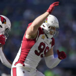 Arizona Cardinals defensive end J.J. Watt (99) reacts after a tackle against the Seattle Seahawks during the first half of an NFL football game in Seattle, Sunday, Oct. 16, 2022. (AP Photo/Abbie Parr)