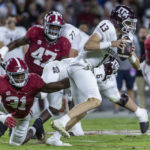 Alabama linebacker Will Anderson Jr. (31) pressures Texas A&M quarterback Haynes King (13) during the first half of an NCAA college football game, Saturday, Oct. 8, 2022, in Tuscaloosa, Ala. (AP Photo/Vasha Hunt)