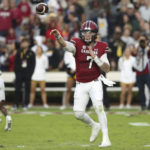 South Carolina quarterback Spencer Rattler (7) throws a short pass during the second half of an NCAA college football game against Missouri, Saturday, Oct. 29, 2022, in Columbia, S.C. (AP Photo/Artie Walker Jr.)