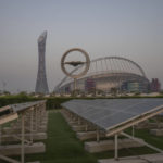 
              Solar panels stand on grounds in front of Khalifa International Stadium, also known as Qatar's national and oldest stadium, which will host matches during the FIFA World Cup 2022, in Doha, Qatar, Saturday, Oct. 15, 2022. (AP Photo/Nariman El-Mofty)
            